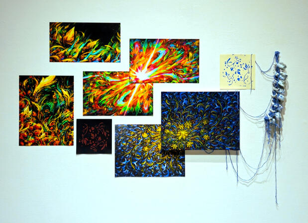 Full photo of the Khokhlosmic capstone installation in the Law Warschaw Gallery, consisting of seven pieces across at least four different mediums: digital (inkjet prints), oil paint on canvas, screenprint, and ceramic mixed media sculpture.